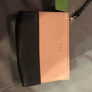 Pale pink and black Kate Spade wristlet